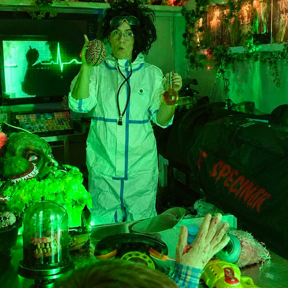 Nutty professor in lab at Billy Bobs during children's Halloween event