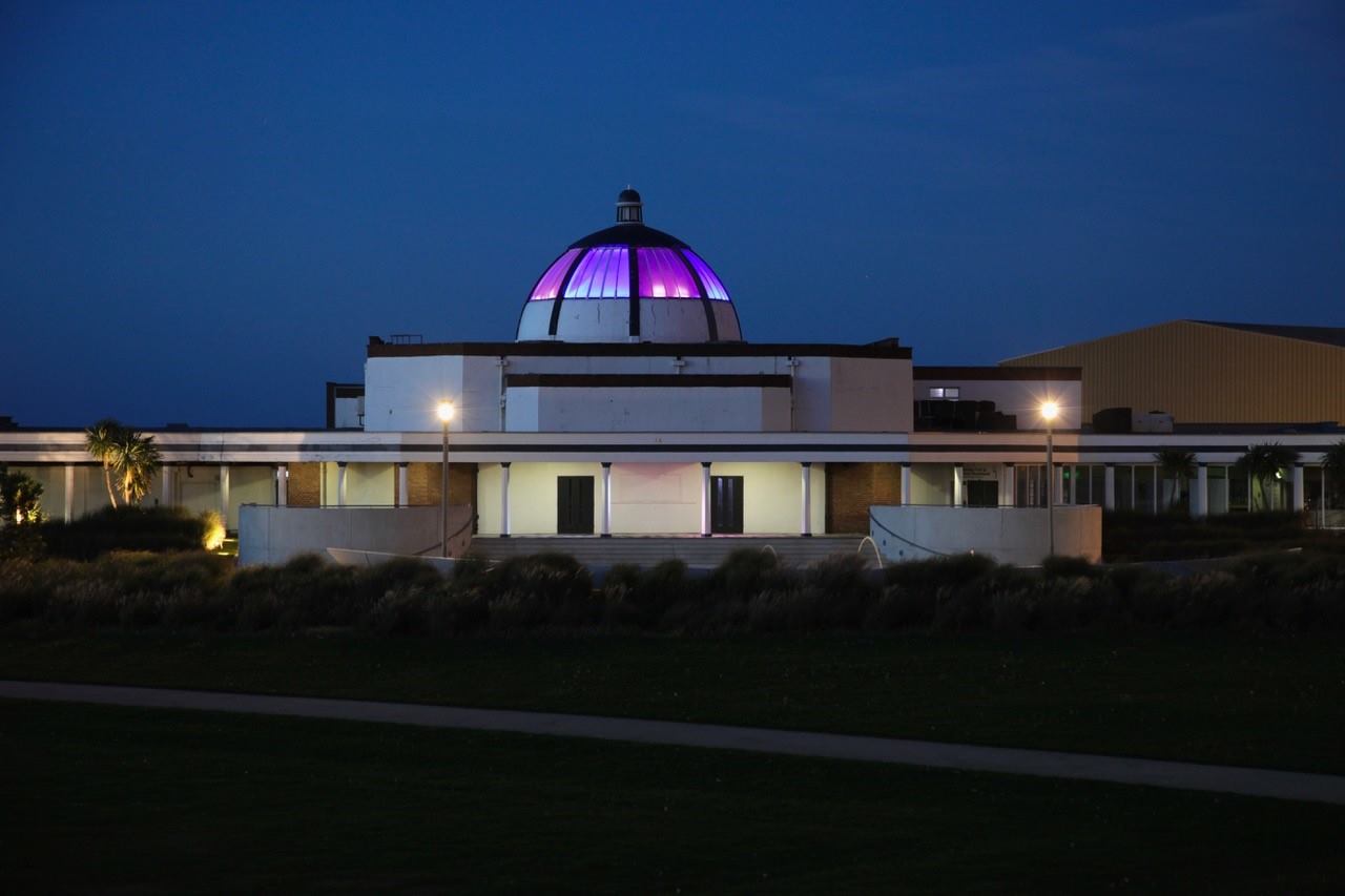 Marine Hall lit up at night