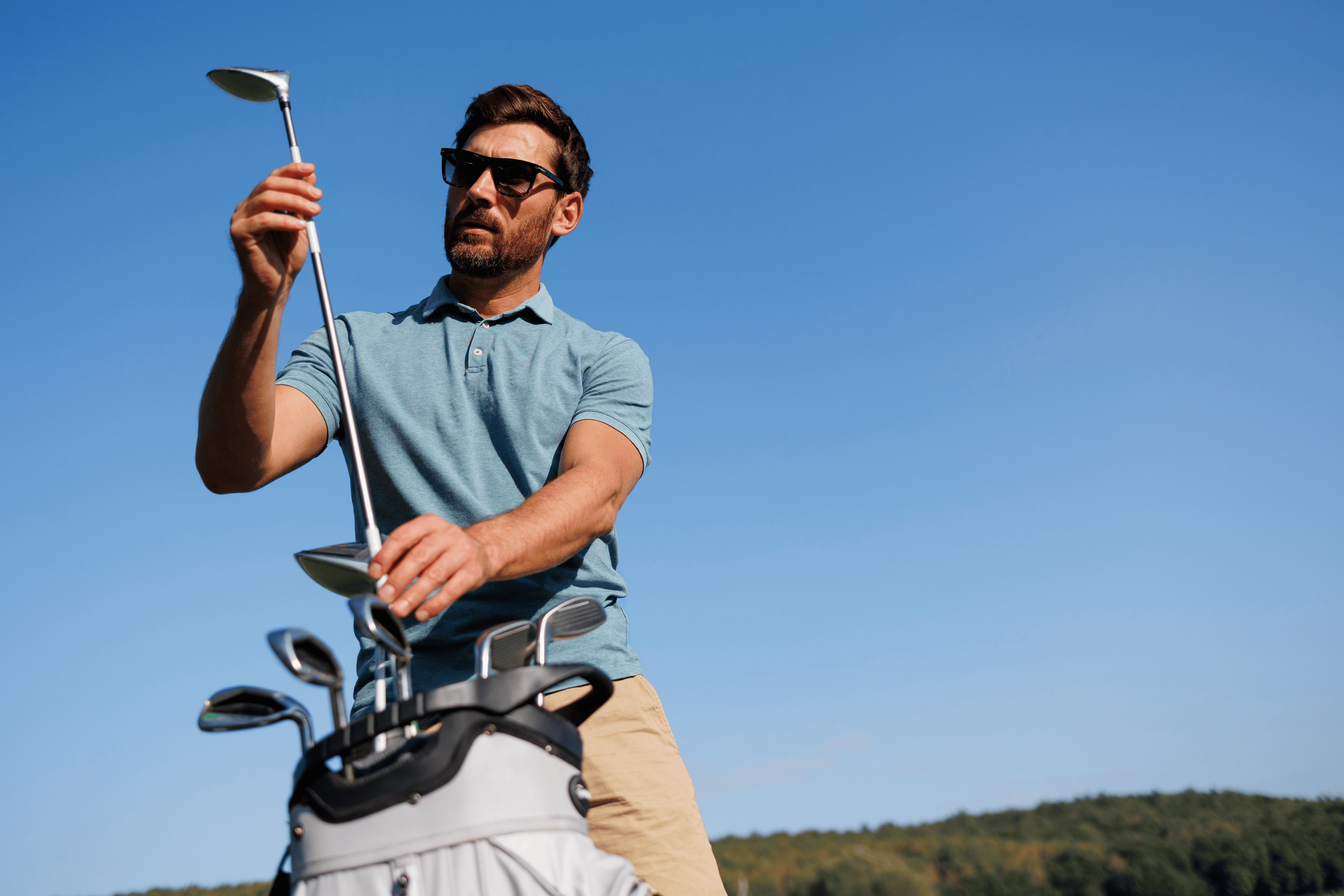 Man holding golf club