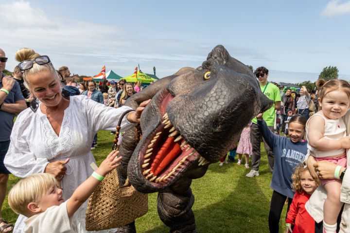 Dinosaur looking at camera at Wanderland family festival