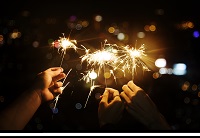 Hands holding sparklers